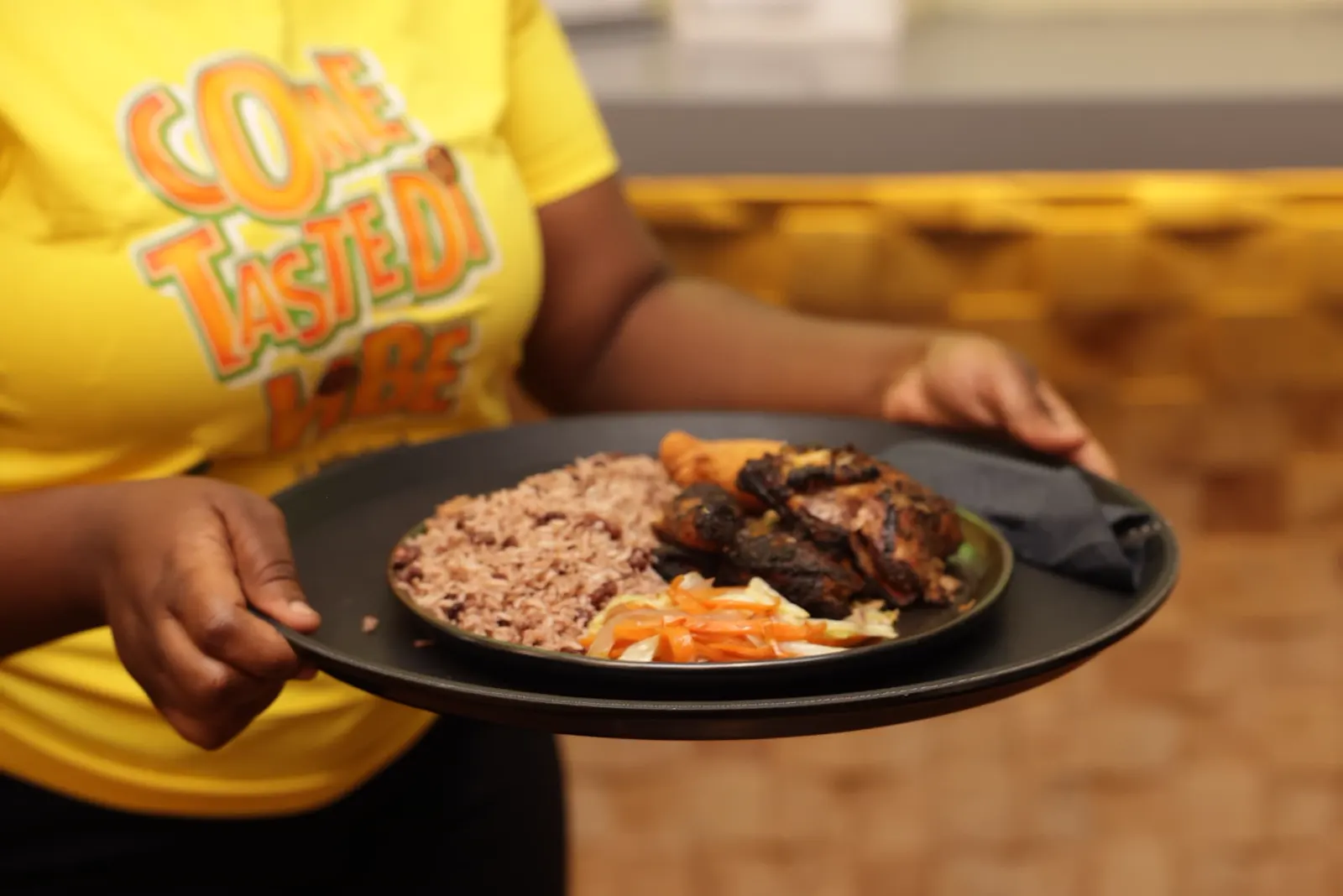 Jerk Harbour weekend brunch plate with charcoal-grilled Jamaican food